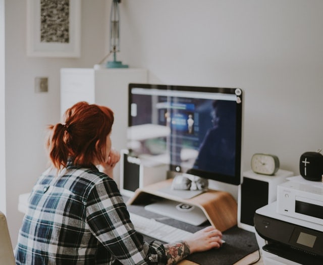 women working on a computer